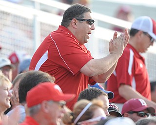 BLOOMINGTON, INDIANA - MAY 30, 2014: Fan Greg DiNello of Youngstown cheers from the stands after a Youngstown State out during Friday nights regional tournament game against Indiana University. (Photo by David Dermer/Youngstown Vindicator)