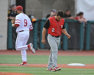 BLOOMINGTON, INDIANA - MAY 30, 2014: Base runner Mike Accardi #2 of Youngstown State hangs his head while walking across the infield after being stranded on third base and being unable to score a run during Friday nights regional tournament game against Indiana University. (Photo by David Dermer/Youngstown Vindicator) Indiana #9 Casey Rodrigue pictured.