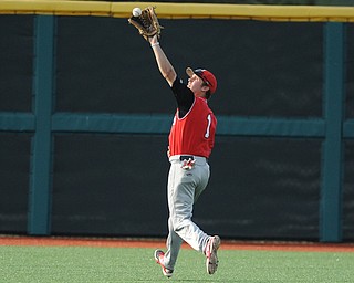 BLOOMINGTON, INDIANA - MAY 30, 2014: Outfielder Kevin Hix #1 of Youngstown State gets under a fly ball for the out early during Friday nights regional tournament game against Indiana University. (Photo by David Dermer/Youngstown Vindicator)