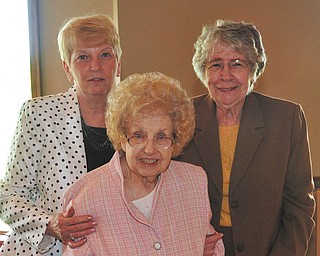 SPECIAL TO THE VINDICATOR
In front is Dorothy Schwers, who was recently presented with the Federation Woman of the Year award by the Youngstown Area Federation of Women’s Clubs Inc. Behind her are Rusti Puromaki, left, and Elva Easton.