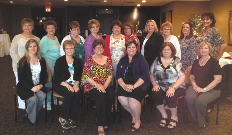 SPECIAL TO THE VINDICATOR
The Austintown Junior Women’s League installed its 2014 officers May 20 at Rachel’s Restaurant in Austintown. Seated from left are Kerri Sahli, adviser to Juniorettes; Nancy Jones, treasurer; Kathy Rusback, president; Linda Crish, second vice president Ohio JWL; Peggy Bennette, second vice president; and Linda Jones, recording secretary. Members who attended the event, standing from left, are Donna Litch, Judy Zoccali, Judy Rodkey, Evie Moore, Sue Hovanec, Deanna Hosey, Colleen Miller, Shirley Schmidt, MaryAnn Herschel and Ruty Rodriguez-Patterson.