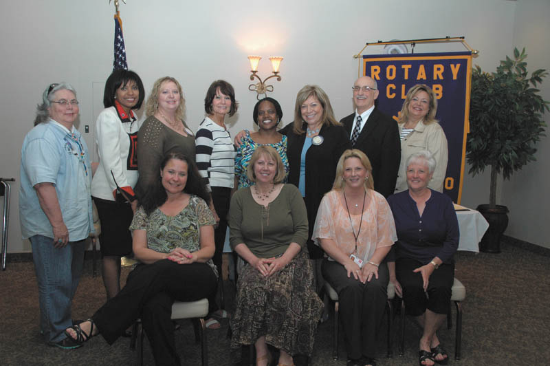 SPECIAL TO THE VINDICATOR
Poland Rotary had its annual Chili Open Golf Awards Luncheon on May 14 at Alberini’s Restaurant. The club gave money to nine local charities. From left to right, in the front row, are Cathy Kristan and Dawn Dougherty of Mahoning County CASA/GAL, Jodi Harmon of Easter Seals and Debbie Ruehs of Poland Interfaith Pantry. In the back are Kathy Price of Mission of Love, Ruthie King of Boys & Girls Club, Shellie Ducheck of Potential Development, Eileen Larson and Audrey Walker of Sojourner House, Maryann Martinko of Poland Rotary, Mike Iberis of Second Harvest Food Bank and Liz McGarry of Hospice of the Valley.

