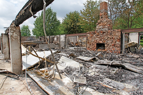 Rubble remains after a Tuesday-morning fire at a clubhouse owned by the Mahoning County Coon Hunters Protective Association. The clubhouse was more than 30 years old and will be rebuilt.