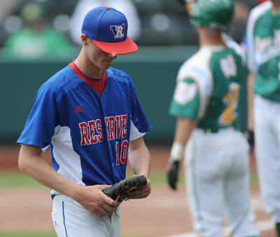 COLUMBUS, OHIO - JUNE 5, 2014: Pitcher Nick Allison #10 of Reserve walks off the field after being pulled from the game in the bottom of the 2nd inning during a OHSAA state semi-final game at Huntington Park. Newark Catholic won 6-2. (Photo by David Dermer/Youngstown Vindicator)
