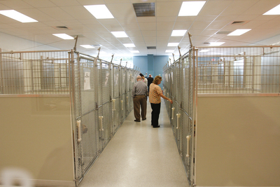        ROBERT K. YOSAY  | THE VINDICATOR.. Dog Kennel Area..Animal Welfare League of Trumbull county ribbon cutting on Belmont Ave across from Squaw Creek in Vienna.