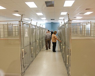 ROBERT K. YOSAY | THE VINDICATOR.. Dog Kennel Area..Animal Welfare League of Trumbull county ribbon cutting on Belmont Ave across from Squaw Creek in Vienna.