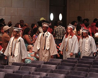 ROBERT K. YOSAY | THE VINDICATOR.. Leaders of the class of 2014 -Valedictorian Angel Bell- Salutatorian Ra'Shawn boykin- Melina Kline - gave invocation and Dayna Fletcher class president. East High School graduation Friday morning at Stambaugh Auditorium
