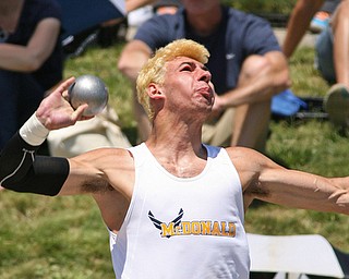 Christian Smith of McDonald puts the shot in the Division 3 finals to finish 4th in the state at the Jesse Owens Memorial Stadium in Columbus, Ohio, Friday, June 6, 2014. (Photo/Mark Hall)