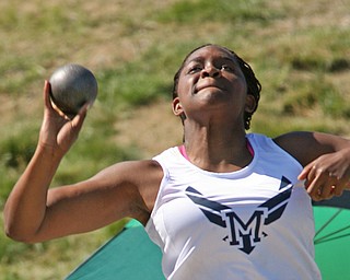 Jai' Lyn Mosley of McDonald puts the shot to win the womens shot put in the in the Division 3 State Meet at the Jesse Owens Memorial Stadium in Columbus, Ohio, Friday, June 6, 2014. (Photo/Mark Hall)