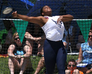 Jai' Lynn Mosley of McDonald releases the discus in the Division 3 State Meet at the Jesse Owens Memorial Stadium in Columbus, Ohio, Friday, June 6, 2014. (Photo/Mark Hall)