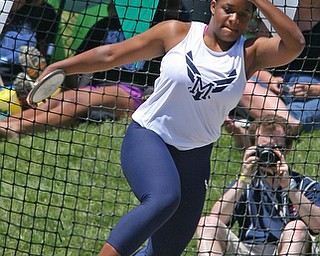 Jai' Lynn Mosley of McDonald spins as she prepares to throw the discus in the Division 3 State Meet at the Jesse Owens Memorial Stadium in Columbus, Ohio, Friday, June 6, 2014. (Photo/Mark Hall)