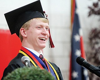 Christopher Halley speaks during commencement exercises Sunday at Canfield High School. He was one of two students selected to address the graduating class based on the new cum-laude honors system.