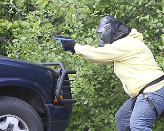 William D Lewis the vindicator Vindy reporter Jeane Starmack during a training exercise with Hubbard PD 6-12 at a vacant building in Hubbard.
