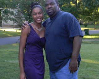 Earl Reynolds is shown with his daughter, Angelique Reynolds in Charlotte.