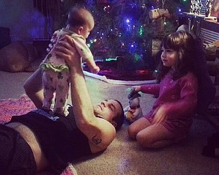 Sophia with her baby brother, Quinn, 3 months, are spending Christmas Eve with their daddy, Joshua. Submitted by Nana Barb Barringer.