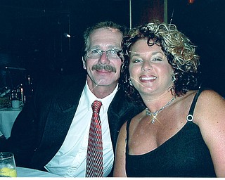 John Liposchak of North Jackson is with his daughter, Patti Carano of Lordstown, on a cruise in the Caribbean.