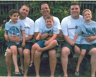Gathered, from left, are Stephen Pacheco holding his son, Stephen Q. of Canfield; Papa Will holding grandson, Alec Will; and Vincent Pacheco with his son Vincent Jr. of Pittsburgh. The photo was taken at a July 4 picnic at PapaÕs house. Sent by Grandma Aida.