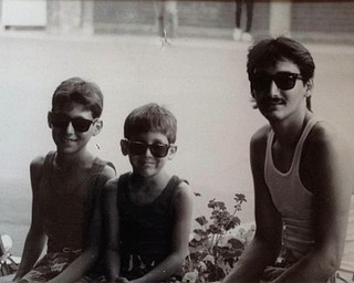 Josh Morales of Campbell and Branden Morales of Boardman with their father, Andres Morales of Campbell, enjoyed a visit to Sea World on June 22, 1986.