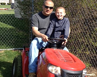 Cindy Martz sent this photo of these two handsome fellows ready to tackle those blades of grass!