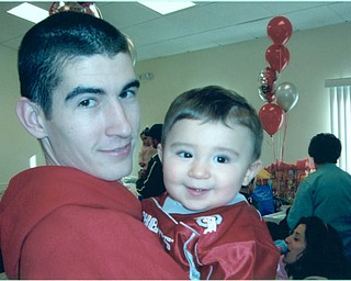 John J. Vanca is with his son Luke in 2005 on Luke's first birthday. Both reside in Campbell.