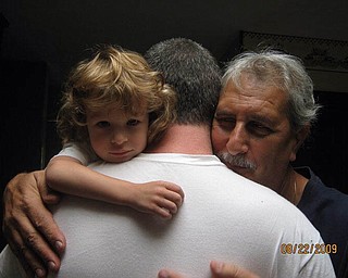 Luca Comichisto, now 8, and his father Christofer Comichisto. They live in Cortland. Grandfather is Lio Comichista of Girard. Sent by grandmother, Bice Comichista.