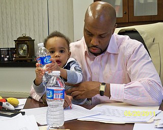 Father and son, Harry L. Johnson III and Harry Liam Johnson are at daddyÕs office in City Hall. Sent by Jaci Johnson.