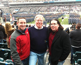 Jerry McNally of Youngstown, center, with sons Sean McNally of Powell, Ohio, left, and Breen McNally, also of Youngstown, at the annual Army/Navy football game in Philadelphia. Breen and Sean took their father to the game for his birthday. They also celebrated BreenÕs upcoming wedding.