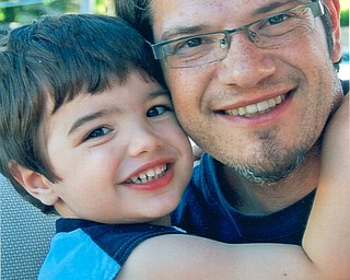 Kevin Dominic with his son, Vincent, both live in Youngstown, sent by Judy Dominic of Hubbard, VincentÕs grandmother.