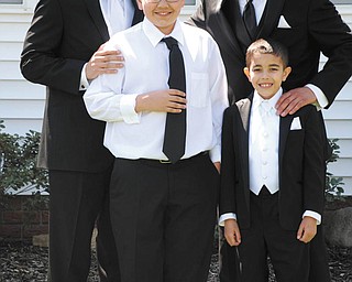 In front, from left, are Santino Jorge, ring bearer and Alex Jorge. And in back are Joseph Jorge on his wedding day, and Michael Jorge, father of all three boys. Sent by grandma, Renee Bero at her grandsons' request.