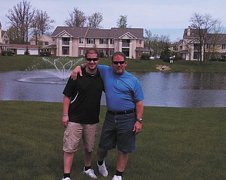 Chad Burbrink of Fort Wayne, Ind., is shown with his father Steve Burbrink of Canfield.