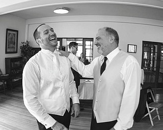 David and Dante DiRusso sharing a laugh at Dante's wedding.
