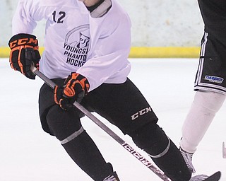 Max Letunov participates in a scrimmage Saturday on Day 2 of the Phantoms tryout camp at the Ice Zone in Boardman. Letunov, who played on the team last season, survived final cuts Sunday to make the roster again for 2014.