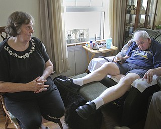 William d Lewis The Vindicator Jerry Riley who is housebound and his wife Linda Riley in the livingroom of their Idora neighborhood home. They are having a fundraiser to help woth cost of building a wheelchair ramp.
