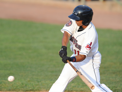 NILES, OHIO - JUNE 17, 2014: Batter Ordomar Valdez #11 of the Scrappers swings before making contact with a pitch he would drive to the outfield for a double in the bottom of the 3rd inning during Tuesday nights New York Penn League game at Eastwood Field. (Photo by David Dermer/Youngstown Vindicator)