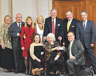 SPECIAL TO THE VINDICATOR
Jeanne D. Tyler donated a half-million dollars to Stambaugh Auditorium, which has prompted the Grand Ballroom to be renamed the Tyler Grand Ballroom. A dinner in her honor took place May 7, and some of those present follow. In front, from left, are Margaret Adams, Tyler, and Mark Gasser. In the back are Susan Berny, Jim Sisek, Suzyn Schwebel-Epstein, Jeanne Simeone, William Conti, Terrence Cloonan and J. David Sabine.