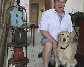 William d Lewis The Vindicator Marley often accompanies her owner Sam Boak to work. Sam Boak is shown at Boak and Sons in Autstintown