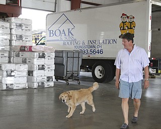 William d Lewis The Vindicator Marley often accompanies her owner Sam Boak to work. Sam Boak is shown at Boak and Sons in Autstintown