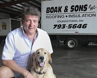 William d Lewis The Vindicator Marley often accompanies her owner Sam Boak to work. Sam Boak is shown at Boak and Sons in Autstintown