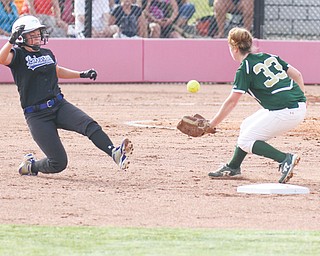 Trumbull All-Star Hannah Petrosky of Lakeview slides into second base as Mahoning’s McKenzie Stimpert of Ursuline goes for the ball during the Mahoning & Trumbull Fast-pitch Senior All-Star Game on Wednesday at the Youngstown State softball complex. Trumbull swept the doubleheader.