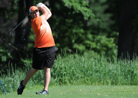 HERMITAGE, PENNSYLVANIA - JUNE 20, 2014: Cameron Gumble of Austintown follows through with his tee shot on the 2nd hole Friday morning at Tam O'Shanter golf course during the Vindy Greatest Golfer tournament. (Photo by David Dermer/Youngstown Vindicator)
