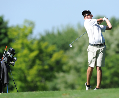 HERMITAGE, PENNSYLVANIA - JUNE 20, 2014: Brian Velasquezof Poland follows through with his tee shot on the 5th hole Friday morning at Tam O'Shanter golf course during the Vindy Greatest Golfer tournament. (Photo by David Dermer/Youngstown Vindicator)