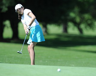 HERMITAGE, PENNSYLVANIA - JUNE 20, 2014: Hadley Spielvogel of Boardman follows through on her putt as the ball breaks toward the hole on the 13th hole Friday morning at Tam O'Shanter golf course during the Vindy Greatest Golfer tournament. (Photo by David Dermer/Youngstown Vindicator)