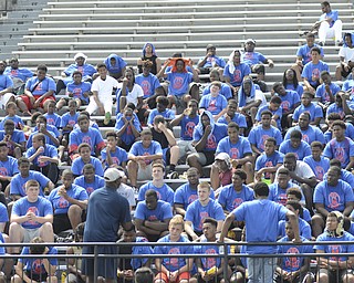 Katie Rickman | The Vindicator.Dave Arnold speaks to a group at the Manningham football camp at Warren G. Harding High School June 21, 2014.