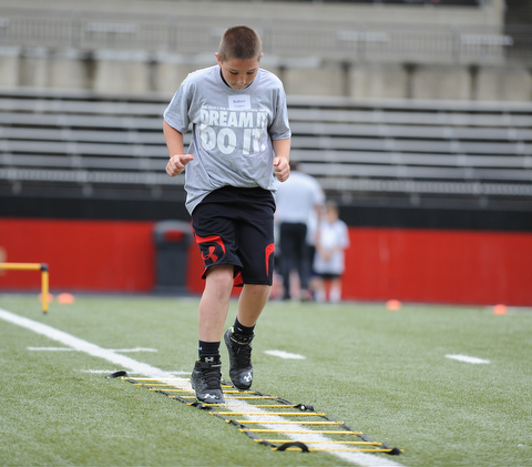 YOUNGSTOWN, OHIO - JUNE 21, 2014: Robert Coonce works on quick feet in a rope drill during the Brad Smith Football Camp at Stambaugh Stadium on the campus of Youngstown State Saturday morning. (Photo by David Dermer/Youngstown Vindicator)