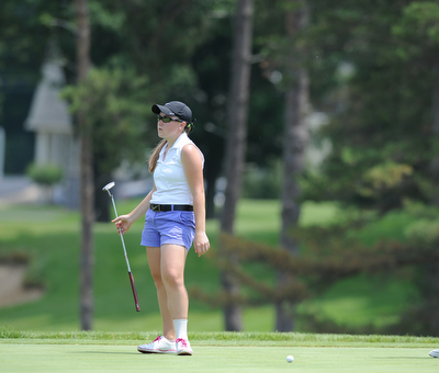 SALEM, OHIO - JUNE 23, 2014: Kerra Loomis of Canfield reacts after missing a putt on the 12th hole on Monday afternoon at the Salem Golf Club during the Vindy Greatest Golfer tournament. (Photo by David Dermer/Youngstown Vindicator)