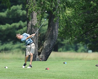 SALEM, OHIO - JUNE 23, 2014: Daniel Lapolla of Warren tees off on the 12th hole Monday afternoon at the Salem Golf Club during the Vindy Greatest Golfer tournament. (Photo by David Dermer/Youngstown Vindicator)