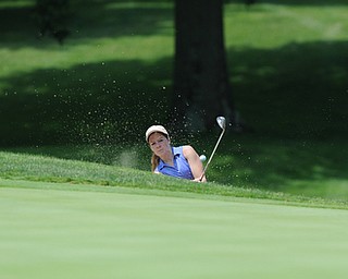 SALEM, OHIO - JUNE 23, 2014: Rachel Russell of Howland chips out of the bunker and onto the green Monday afternoon at the Salem Golf Club during the Vindy Greatest Golfer tournament. (Photo by David Dermer/Youngstown Vindicator)