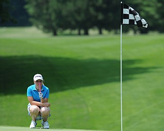 SALEM, OHIO - JUNE 23, 2014: Kaci Carpenter on Canfield lines up her shot on the green on Monday afternoon at the Salem Golf Club during the Vindy Greatest Golfer tournament. (Photo by David Dermer/Youngstown Vindicator)