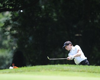 SALEM, OHIO - JUNE 23, 2014: Michael Butch of Austintown chips his ball from the short rough onto the green on the 15th hole on Monday afternoon at the Salem Golf Club during the Vindy Greatest Golfer tournament. (Photo by David Dermer/Youngstown Vindicator)