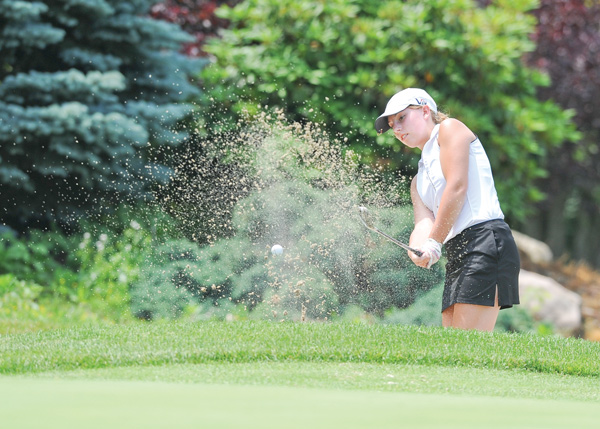 Nicolette Eddy of Kennedy chips out of the bunker on the 12th hole at Salem Golf Club during Monday’s Greatest Juniors qualifier. It was a difficult afternoon for Eddy and most of the golfers, but four more juniors earned a spot in the championship on July 27 at Avalon Lakes Golf Club.